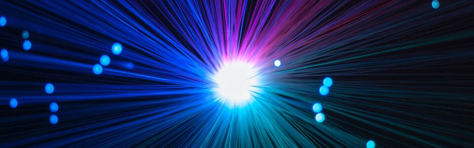 Fiber optic cables create colors that streak toward a center light
