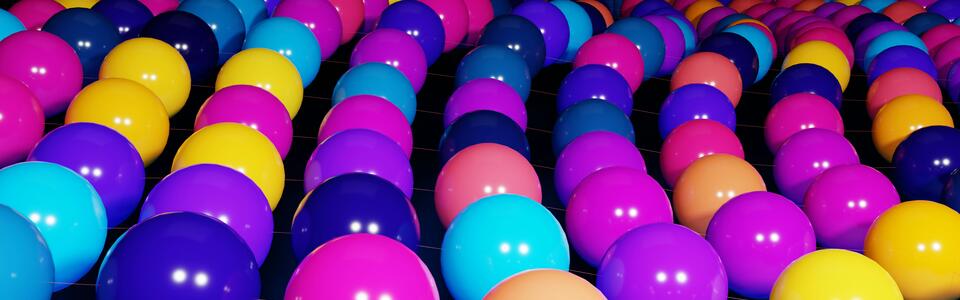 Colorful marbles lined up in rows