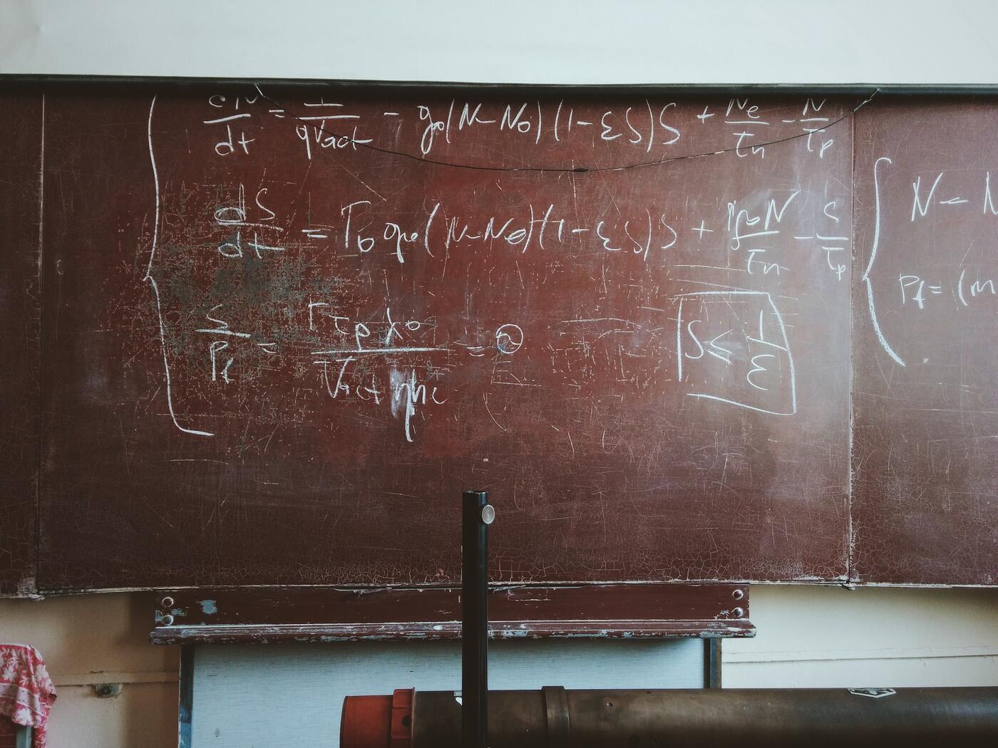 Formulas on a chalkboard