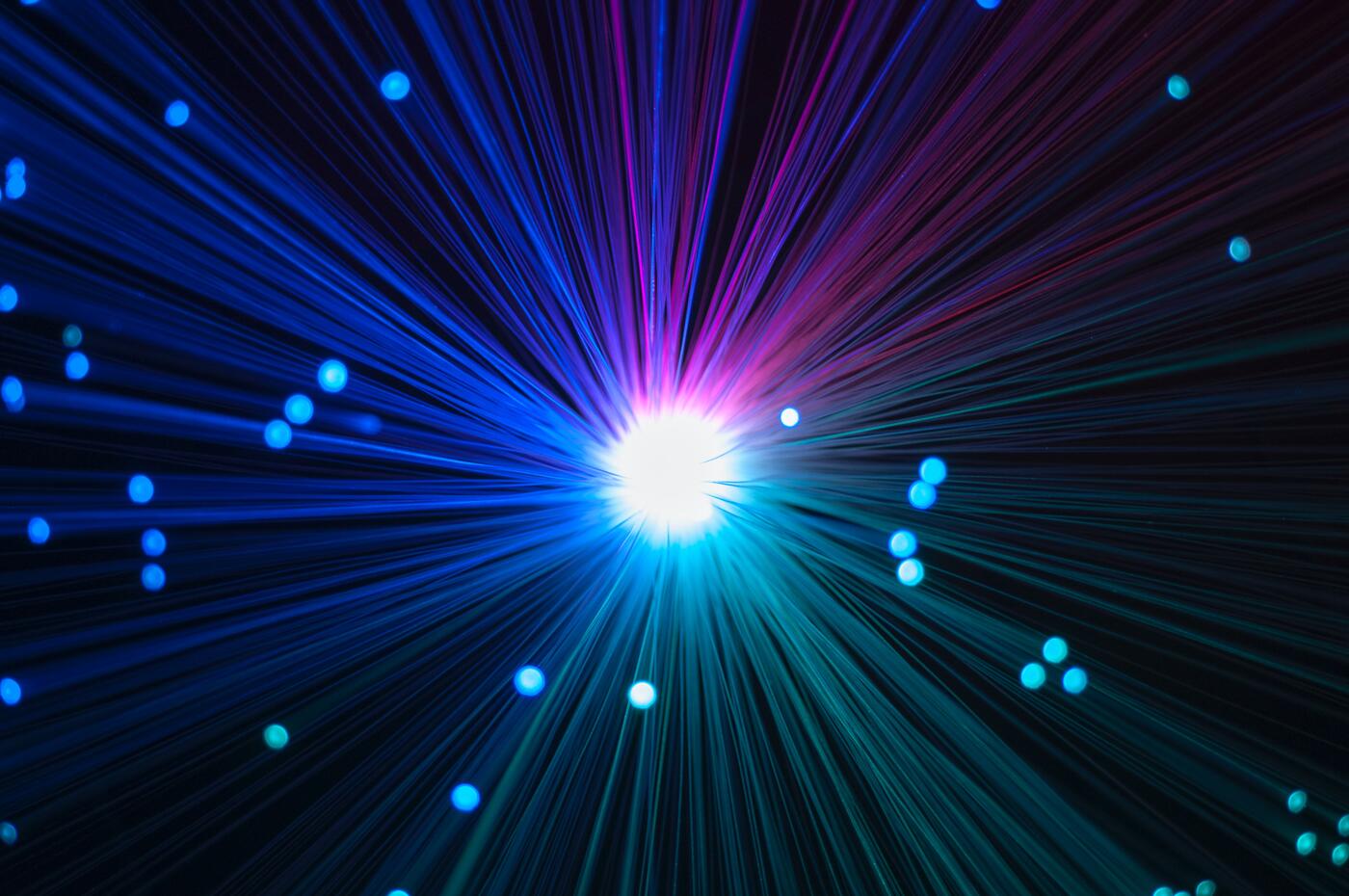 Fiber optic cables create colors that streak toward a center light