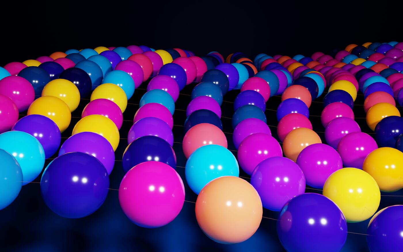 Colorful marbles lined up in rows